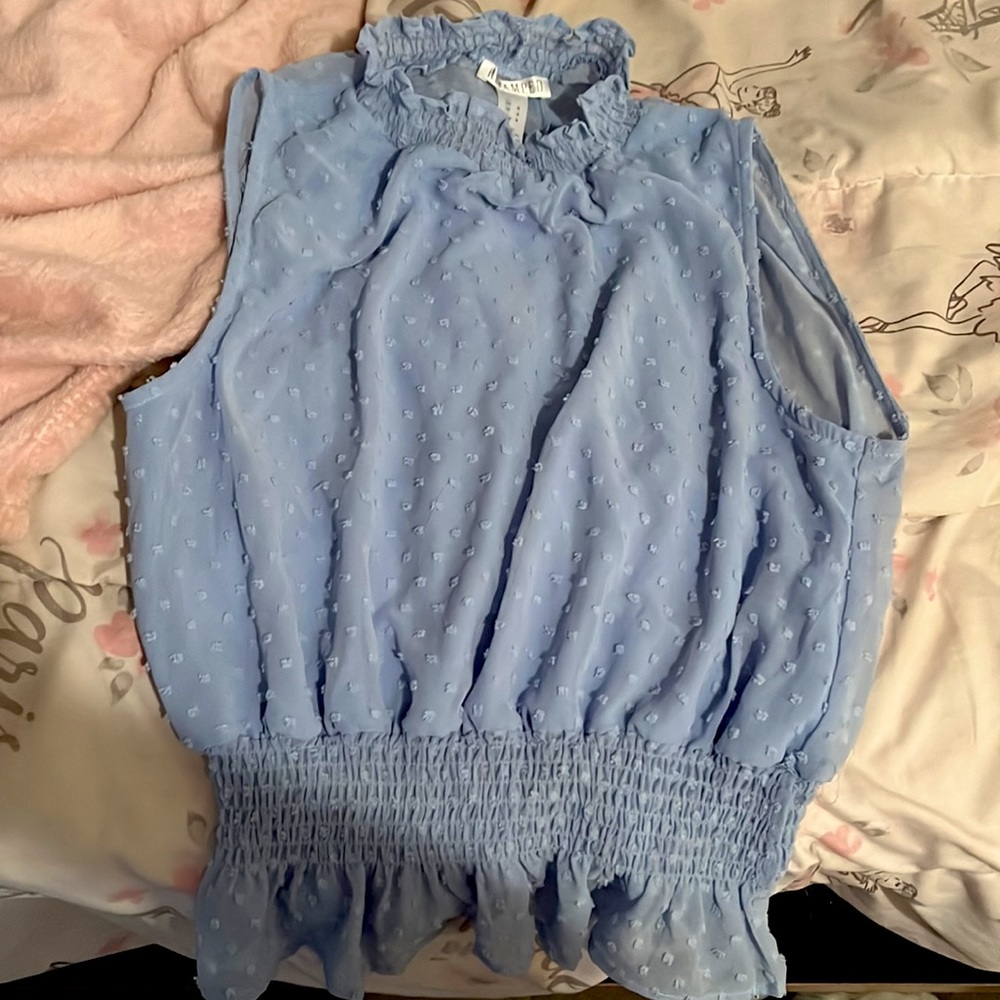 A light blue blouse